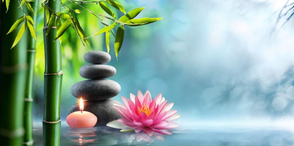 bamboo, candle, balanced rocks